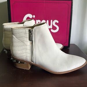 White bootie, never worn.
